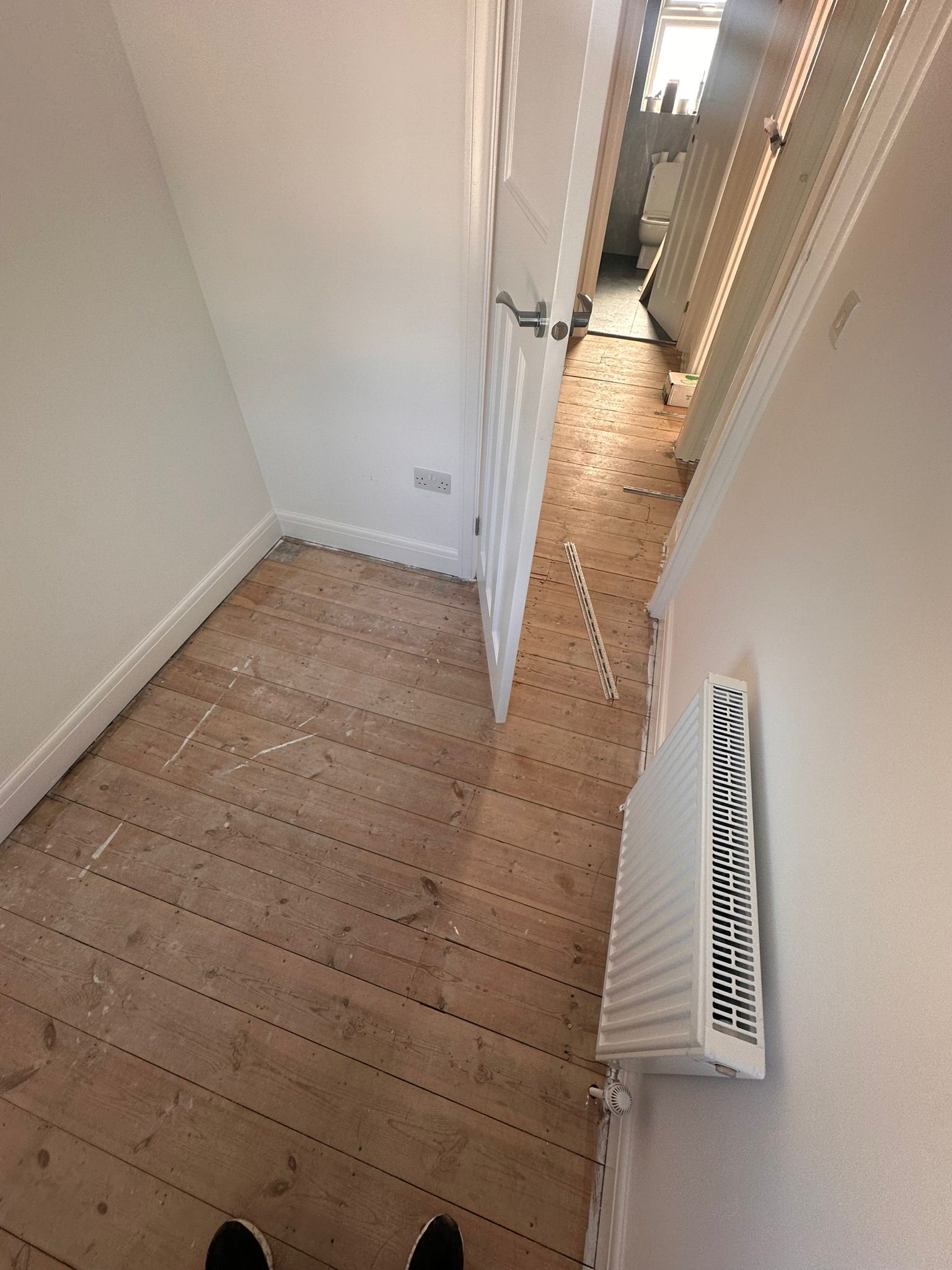 Before: Bare Floorboards