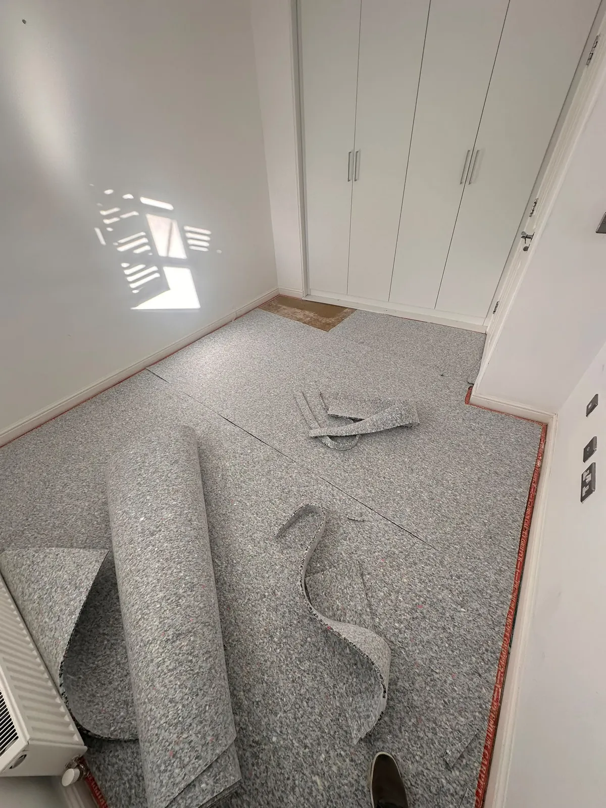 New Cloud 9 underlay being precision cut and fitted in bedroom — Bromley BR1