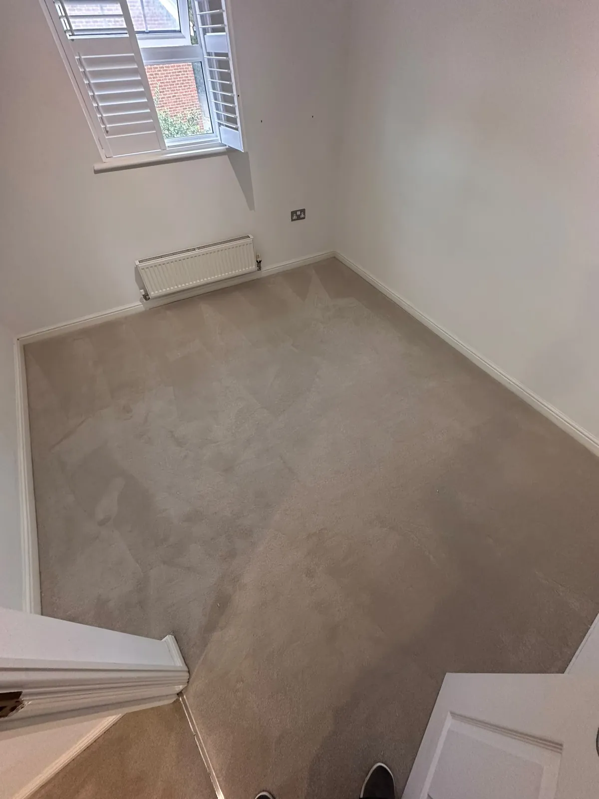 Bedroom showing existing worn carpet before uplift and refit — Bromley BR1