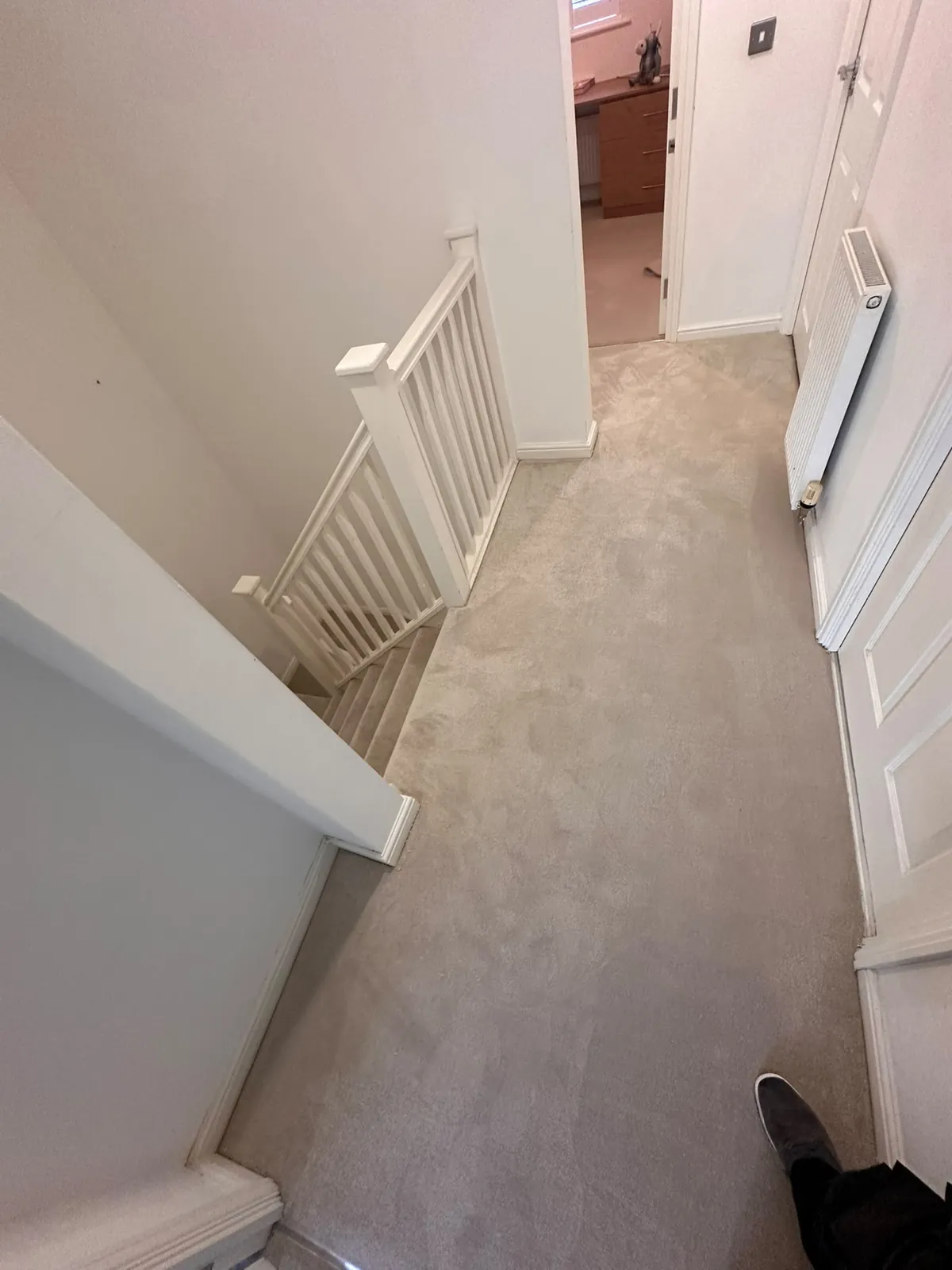 Upstairs landing with worn carpet leading to bedrooms before uplift — Bromley BR1