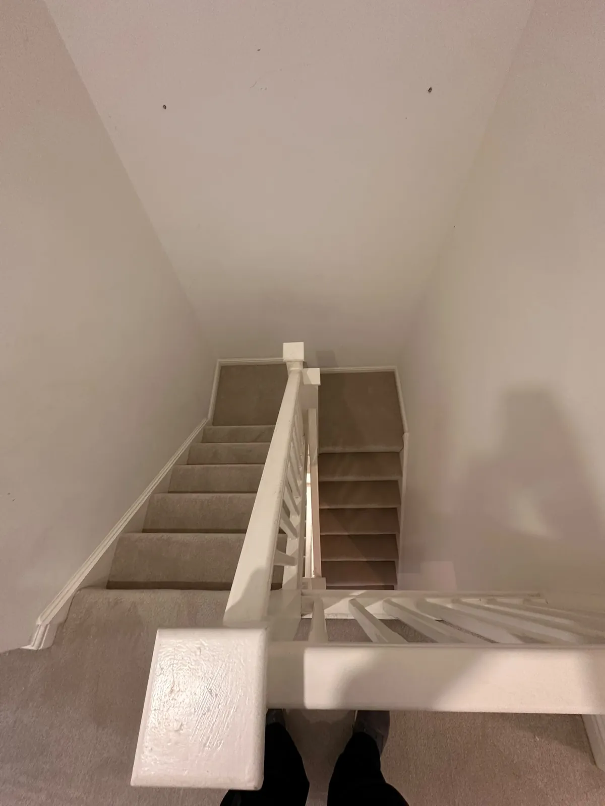 Second staircase flight with worn carpet before uplift — Bromley BR1