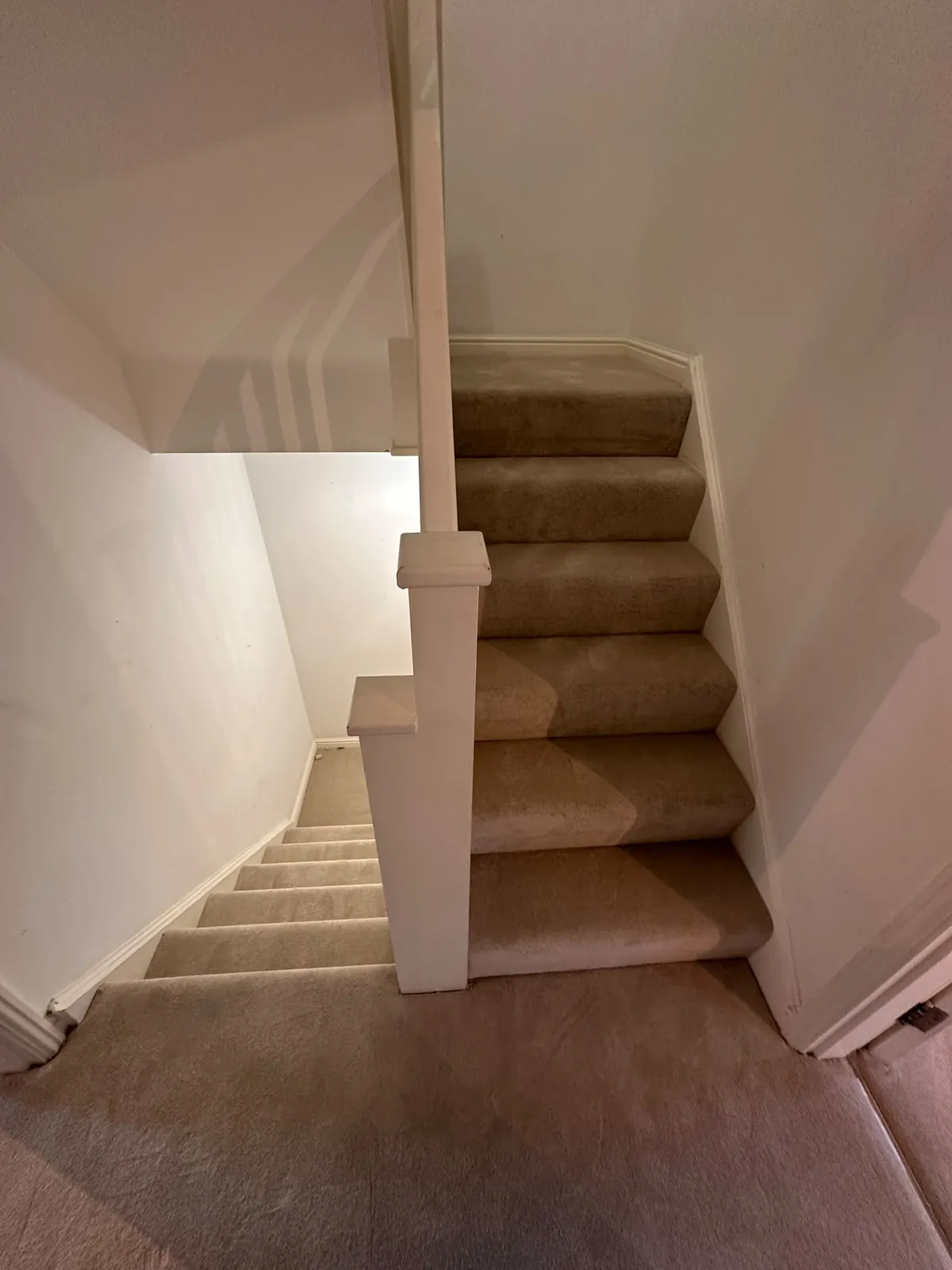 Existing worn carpet on staircase in Bromley BR1 before uplift