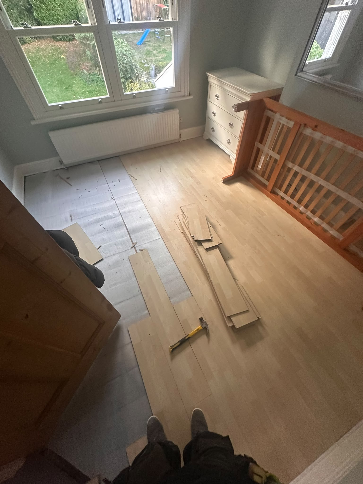 Before: Laminate Bedroom