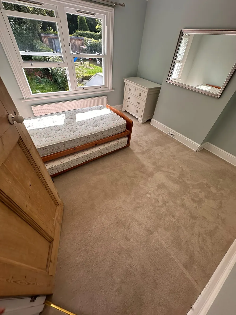 Bedroom with new Fulham Leather polypropylene twist pile carpet fitted wall to wall, painted scotia left in place — South Croydon